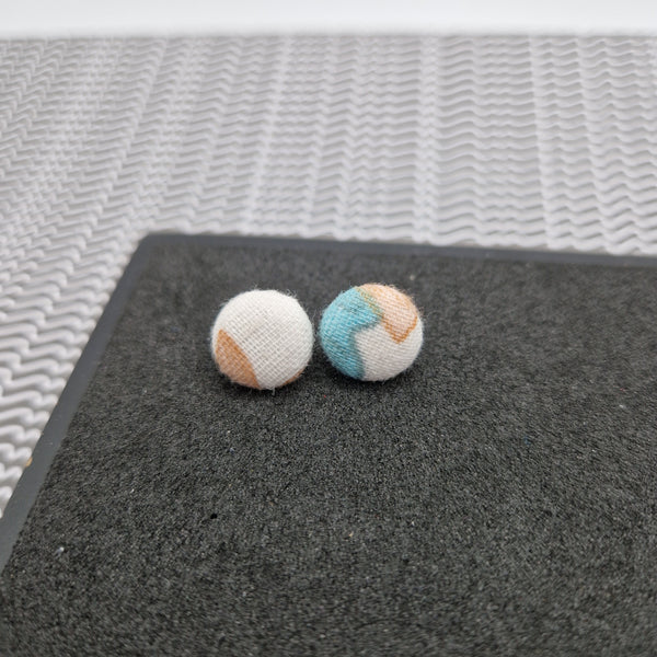 Colourful button stud earrings.