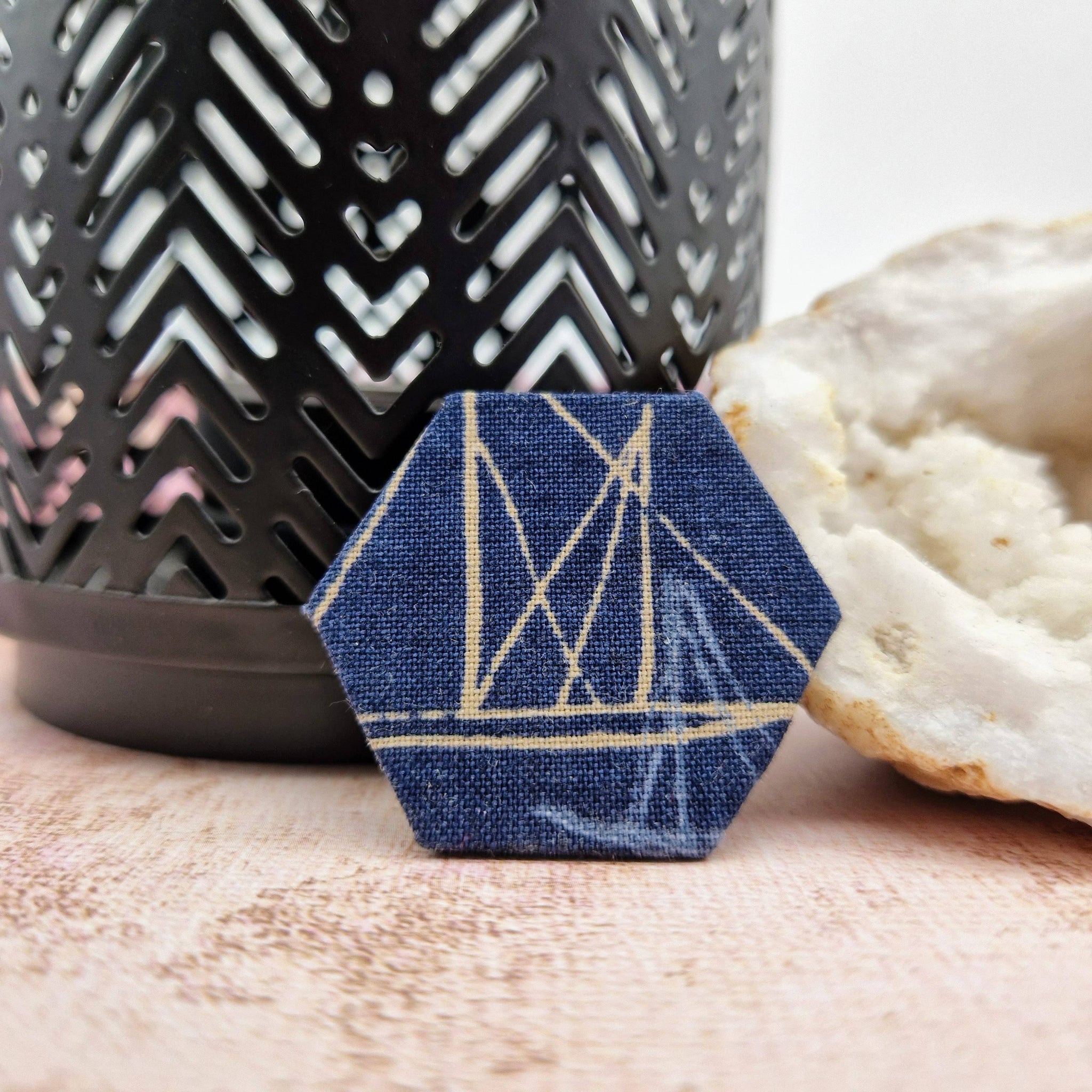 Blue hexagonal Brooch with a boat