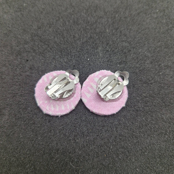 Purple and white clip on earrings