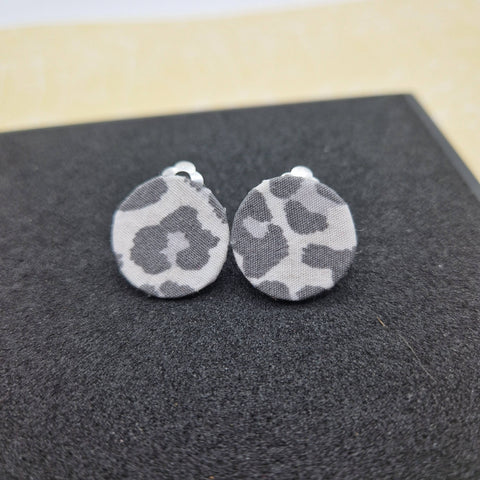 Grey and white animal print clip on earrings