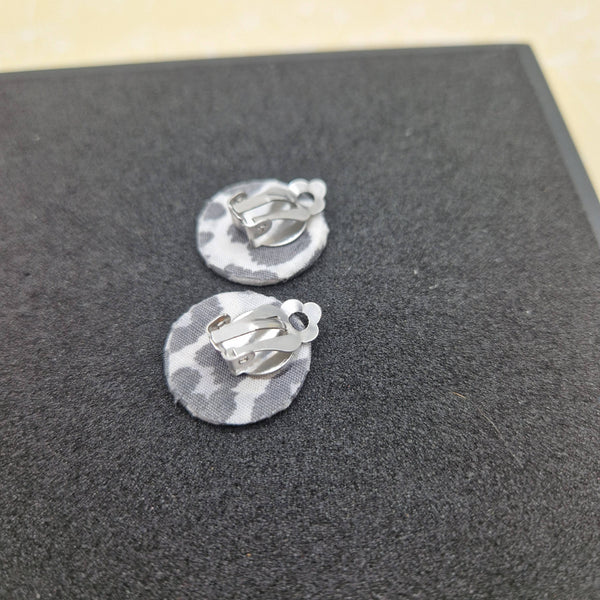 Grey and white animal print clip on earrings