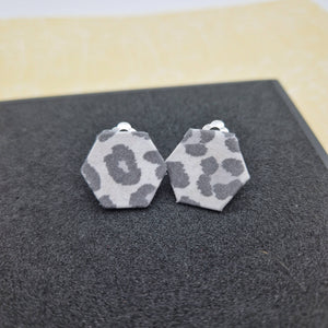 Grey and white hexagonal animal print clip on earrings