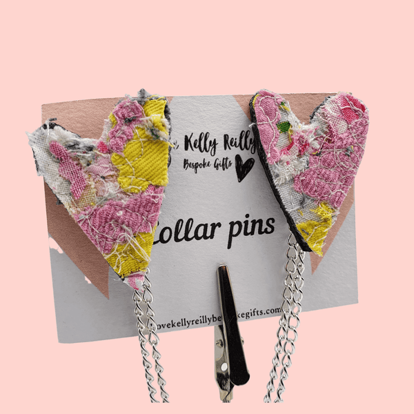 pink and yellow collar pins displayed on a love kelly reilly bespoke gifts  logo card