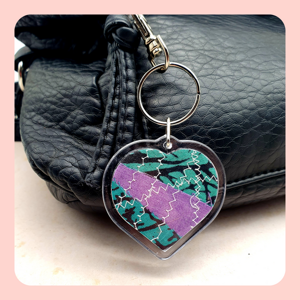 Keyring. Green and purple fabric scraps, circle and heart shapes.