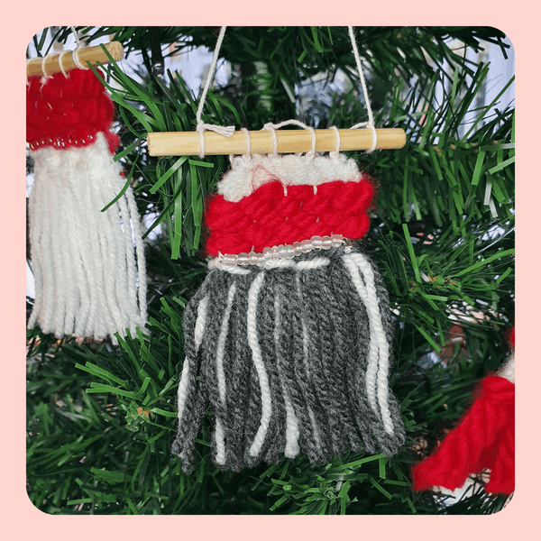 Festive tree decoration, mini red, white and grey weaving.