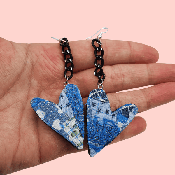 Blue heart dandle earrings on a black chain