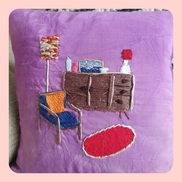 Cushion, pillow. Tie-dyed, up-cycled fabric cushion cover with retro hand embroidered living room scene
