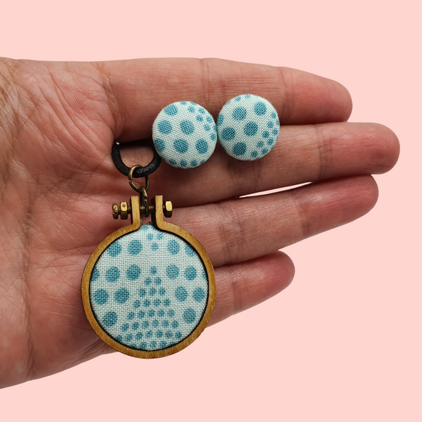 Blue polka dot hoop necklace with matching button studs.