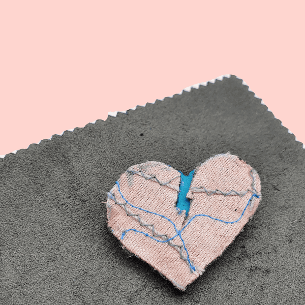 Pink and grey fabric heart brooch inspired by Stranger Things