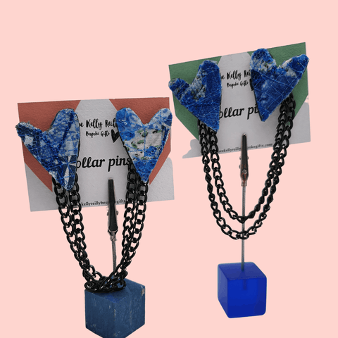 Blue upcycled fabric collar pins with removable black chain.