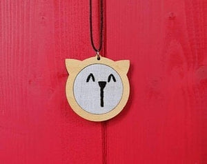 Necklace, embroidered cat/bear in mini hoop.