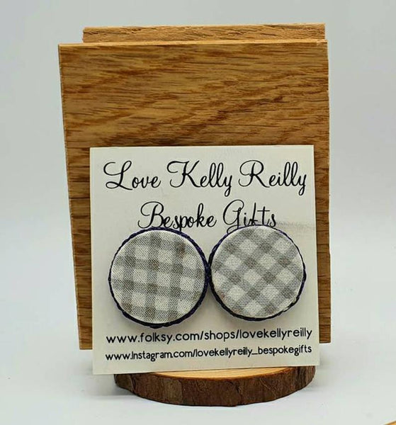 Grey check fabric circle studs with purple pleated rope detail and stainless steel posts