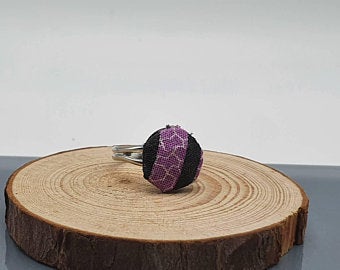 Fabric ring, various fabric designs with an adjustable band in silver tone.